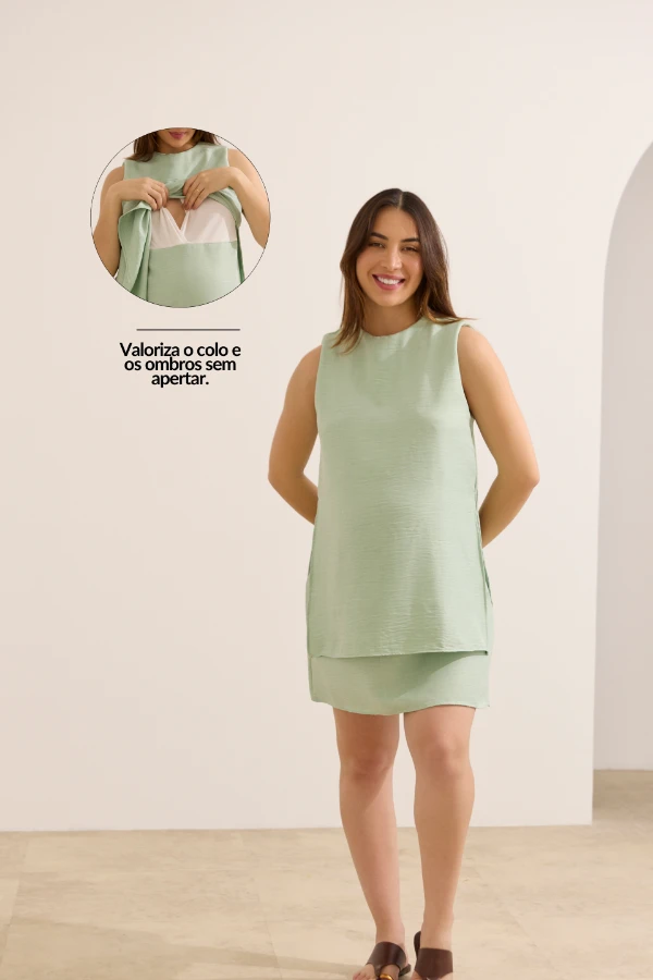 Vestido gestante verde claro minimalista para chá de bebê com conforto