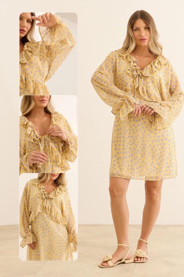 Gestante usando vestidinho curto floral amarelo com babados e decote ajustável para gestação e amamentação.