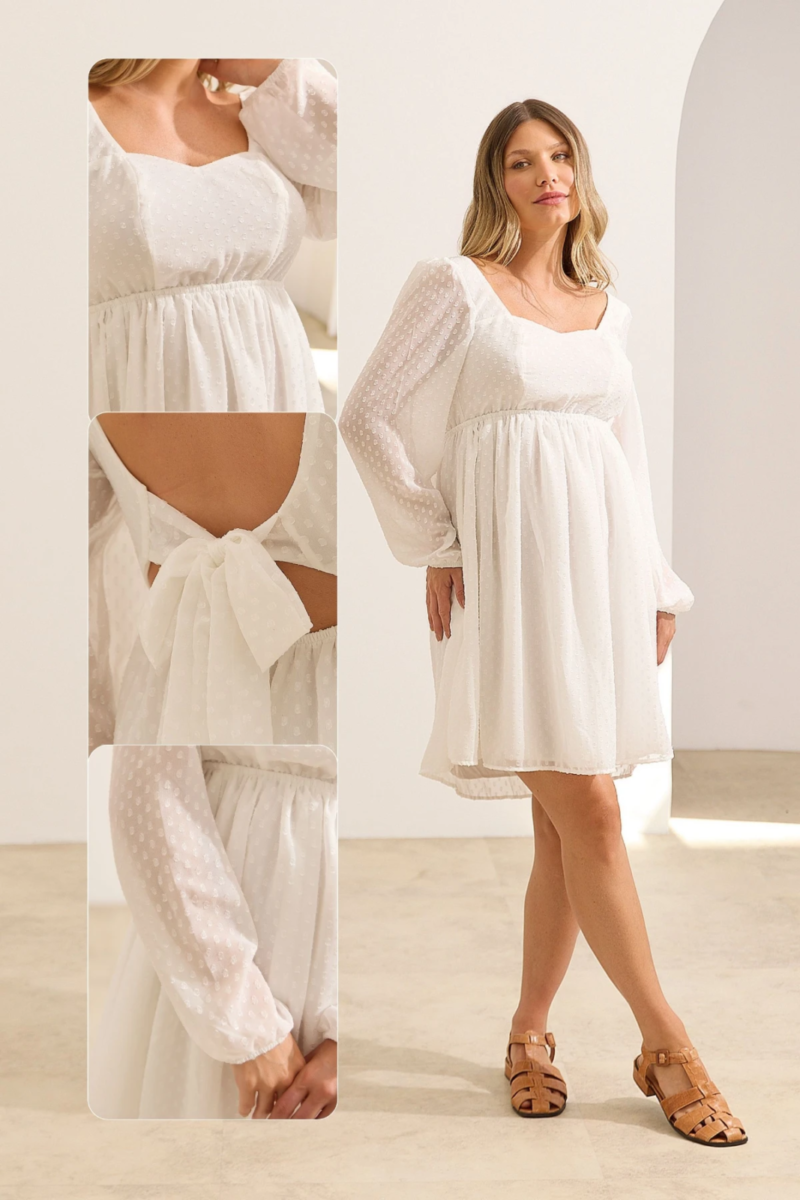 Vestido branco para gestante curto com mangas transparentes e detalhe em poá delicado, ideal para chá revelação, ensaio gestante e fotos da maternidade.